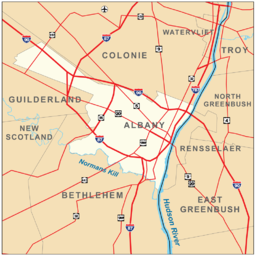 Map shows the city of Albany on the west bank of the Hudson, surrounded by the towns of Colonie, Guilderland, and Bethlehem. Roads are also shown. Interstates 90, 87, and 787 pass through the city boundaries.