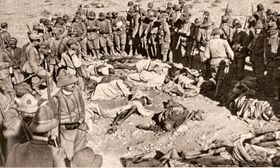 Italian Alpini and Libyan corpses