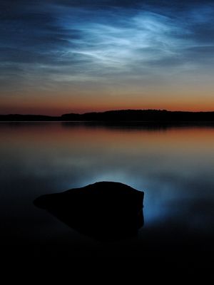 Noctilucent clouds over Lake Saimaa, Finland.