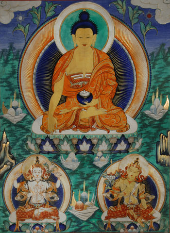 19th Century Mongolian distemper painting with highlights of gold, depicting Shakyamuni flanked by Avalokiteśvara and Manjushri The form of Manjushri depicted here, is not wielding the characteristic flaming sword, but there are many forms of the eight great bodhisattvas, some are based on the Indian tradition, and other from visions of historical masters.