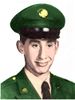 Head of a young smiling Hispanic man wearing a green military uniform and peaked cap, with an American flag in the background.