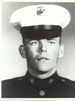 A black and white headshot image of Phipps wearing his military dress uniform with hat.