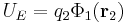 U_E = q_2 \Phi_1(\mathbf r_2)