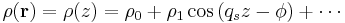 \rho (\mathbf{r})=\rho (z)=\rho_0+\rho_1\cos\left (q_sz-\phi\right )+\cdots