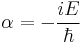 \alpha = -\frac{i E}{\hbar} 