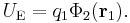 U_\mathrm{E} = q_1 \Phi_2(\mathbf r_1).