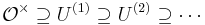 \mathcal{O}^\times\supseteq U^{(1)}\supseteq U^{(2)}\supseteq\cdots