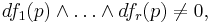 df_1(p) \wedge \ldots \wedge df_r(p) \neq 0,