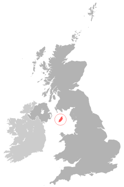 Location of  Isle of Man  (red)in the Irish Sea (Manx Sea) between England · Scotland · Wales and Northern Ireland  (dark grey)