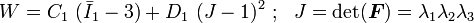 W=C_{{1}}~({\bar  {I}}_{1}-3)+D_{1}~(J-1)^{2}~;~~J=\det({\boldsymbol  {F}})=\lambda _{1}\lambda _{2}\lambda _{3}