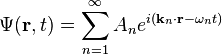 \Psi ({\mathbf  {r}},t)=\sum _{{n=1}}^{\infty }A_{n}e^{{i({\mathbf  {k}}_{n}\cdot {\mathbf  {r}}-\omega _{n}t)}}\,\!