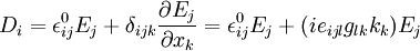 D_{{i}}=\epsilon _{{ij}}^{{0}}E_{{j}}+\delta _{{ijk}}{\frac  {\partial E_{{j}}}{\partial x_{{k}}}}=\epsilon _{{ij}}^{{0}}E_{{j}}+(ie_{{ijl}}{g}_{{lk}}k_{k})E_{{j}}\,