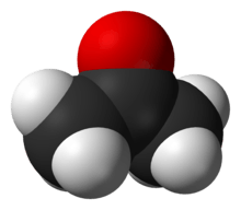 A ball structure of a molecule. Its backbone is a zig-zag chain of three carbon atoms connected in the center to an oxygen atom and on the end to 6 hydrogens.