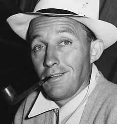 A man wearing a hat with white shirt.