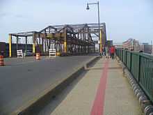 The Charlestown Bridge, looking north. The red line on the pavement is the Freedom Trail marking.