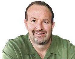 Head and shoulders photograph of Crawford Ker, middle-aged white man with salt-and-pepper beard, dressed in green polo shirt, circa 2008.