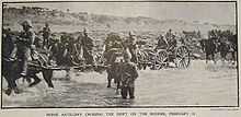 French's cavalry at Klip Drift on the Modder River, showing men, horses and guns crossing the river.