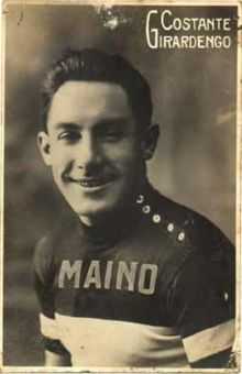 A man looking at a camera while posing.