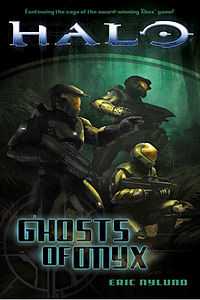 Cover shows three armor-clad figures carrying futuristic guns.