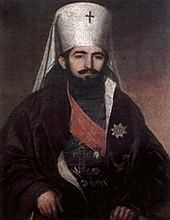 Painting of bearded young man with white Orthodox hat