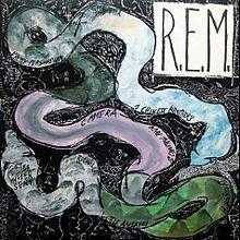 A watercolor painting of a snake with two heads that has the names of the songs from Reckoning written on it, with a large white square in the upper-left corner that has "R.E.M." written in it