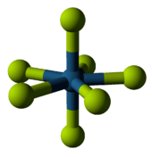 Ball and stick drawing showing central violet ball with a yellow one directly above and below and then an equatorial belt of 5 surrounding yellow balls.