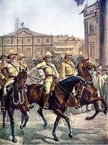 Lord Robert's entry into Kimberley, showing jubilant crowds outside the town hall as Roberts takes the salute on horseback