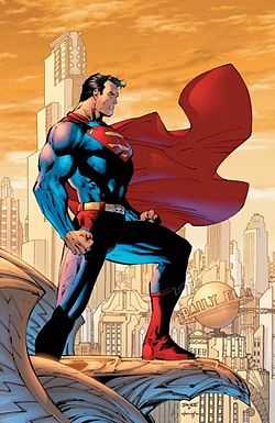 Superman standing on an a eagle gargoyle, with the Metropolis skyline behind him.