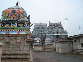 outer courtyard of a temple with two temple towers