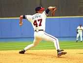 Tom Glavine, with the Atlanta Braves, in the middle of his pitching delivery