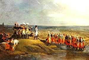 Two groups of well-dressed officers, one group stands on a hill, and the other group approaches them.