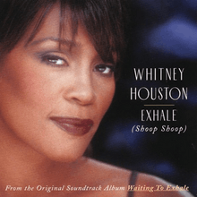 The face of an Afro-American woman smiling. She has a brunette hair and is wearing dark-colored lip color. To the right of the image, the words "Whitney Houston" are printed, below which are the words "Exhale" and "Shoop Shoop." To the bottom of the image, "From the original soundtrack album Waiting to Exhale" is printed.