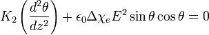 K_{2}\left({\frac  {d^{2}\theta }{dz^{2}}}\right)+\epsilon _{0}\Delta \chi _{e}E^{2}\sin {\theta }\cos {\theta }=0