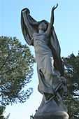 Another statue designed by Auguste Carli in the Cimetière Saint-Pierre in Marseille