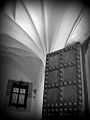 A Black and White Photo of an Antique Door in Toledo Spain.jpeg