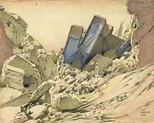 Against a sand-coloured sky and foreground, two sections of damaged red brick walls frame a mass of rubble and fallen blue girders