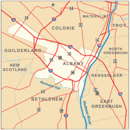 Map shows the city of Albany on the west bank of the Hudson, surrounded by the towns of Colonie, Guilderland, and Bethlehem. Roads are also shown. Interstates 90, 87, and 787 pass through the city boundaries.