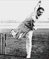 A cricketer pictured just after having bowled the ball