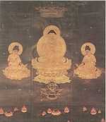 Frontal view of a deity seated on a pedestal framed by two seated attendants.