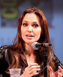 A portrait of a woman with long brown hair