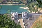 Sculpture perched on the front of the dam of Arriaran (Gipuzkoa)