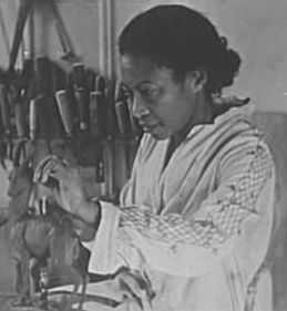 Augusta Savage at work in her studio in Harlem in the 1920s/1930s.