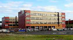 Photograph of a large commercial building