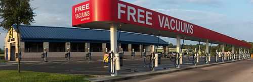 Automotive vacuums in Bayonet Point, Florida. Although the sign says "free", a paid car wash is required first.