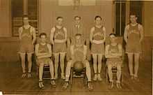 Basketball players in a group photograph