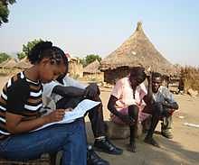 Ethiopian Chemical Engineer Firehiwot Mengesha, of Gaia Association speaks with Sudanese refugees in the Bonga refugee camp as part PGI's education program.