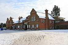 Long low red brick building