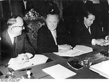 Walter Hallstein, Konrad Adenauer and Herbert Blankenhorn sitting at the conference table