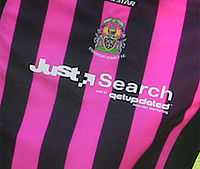 Stockport County wore a pink and Black kit during Pre-Season