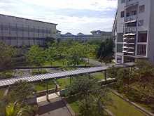 An aerial view of Multimedia University's Cyberjaya campus' garden and covered walkway.